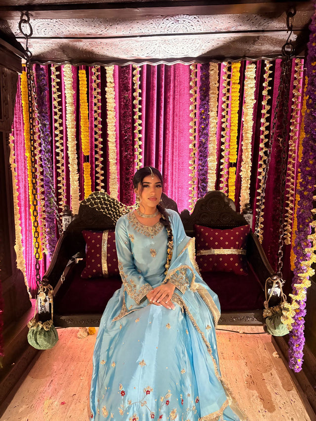 Ethnic Edge client in a custom outfit